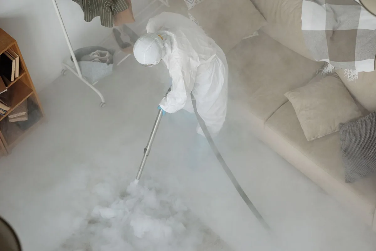 Biohazard cleanup technician in protective equipment, Menifee, CA